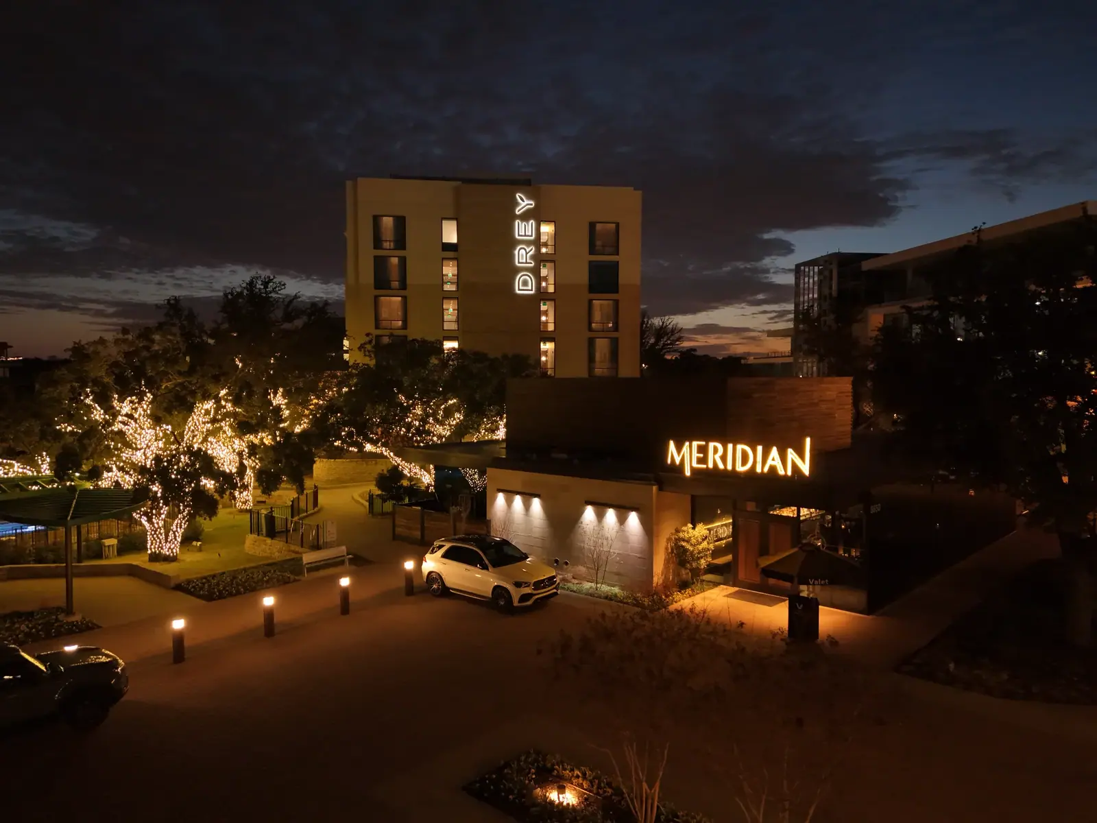 Twilight aerial photograph of a hospitality property