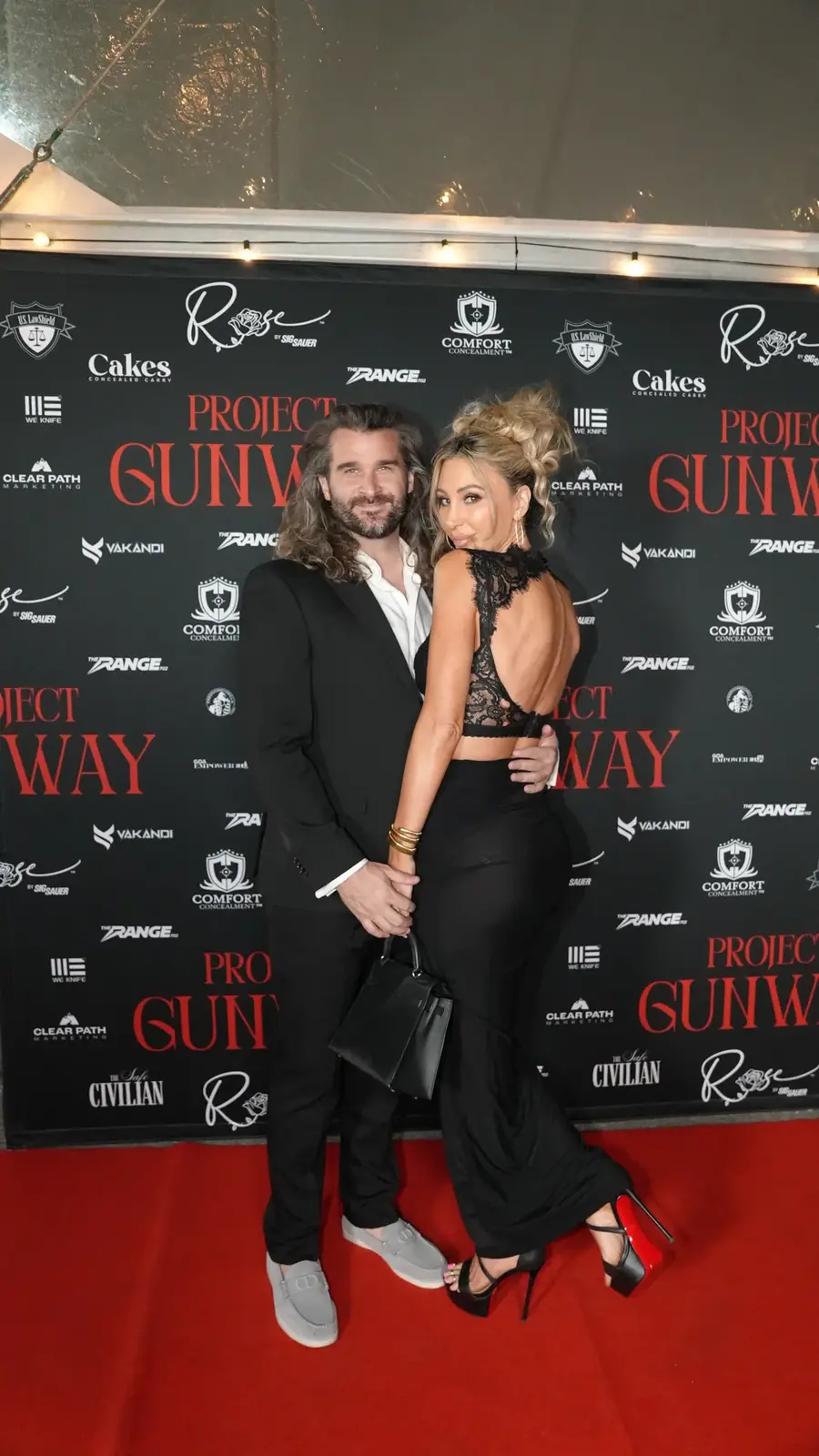 Guest arrivals photographed at a fashion event